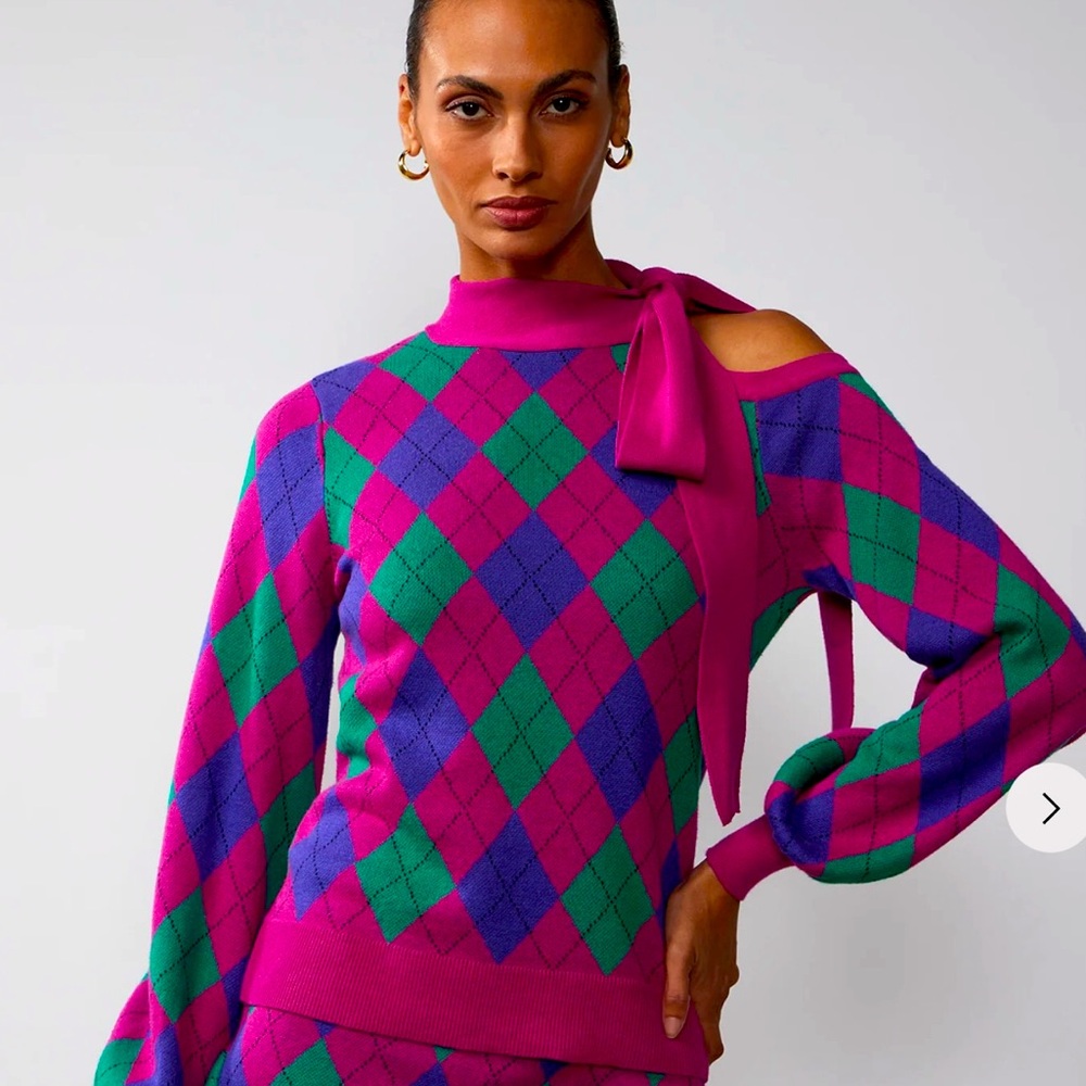 Just in time for Fall; Lon sleeve shoulder out argyle sweater with bow